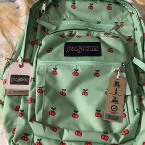 Brand new green with cherries, Jan sport, extra large backpack